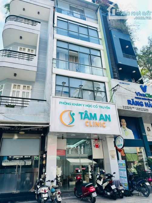 BÁN GẤP! NHÀ 52 TRẦN KHẮC CHÂN-4 TẦNG THANG MÁY-HỢP ĐỒNG THUÊ 65 TRIỆU/THÁNG-GIÁ:21 TỶ - Ảnh 1